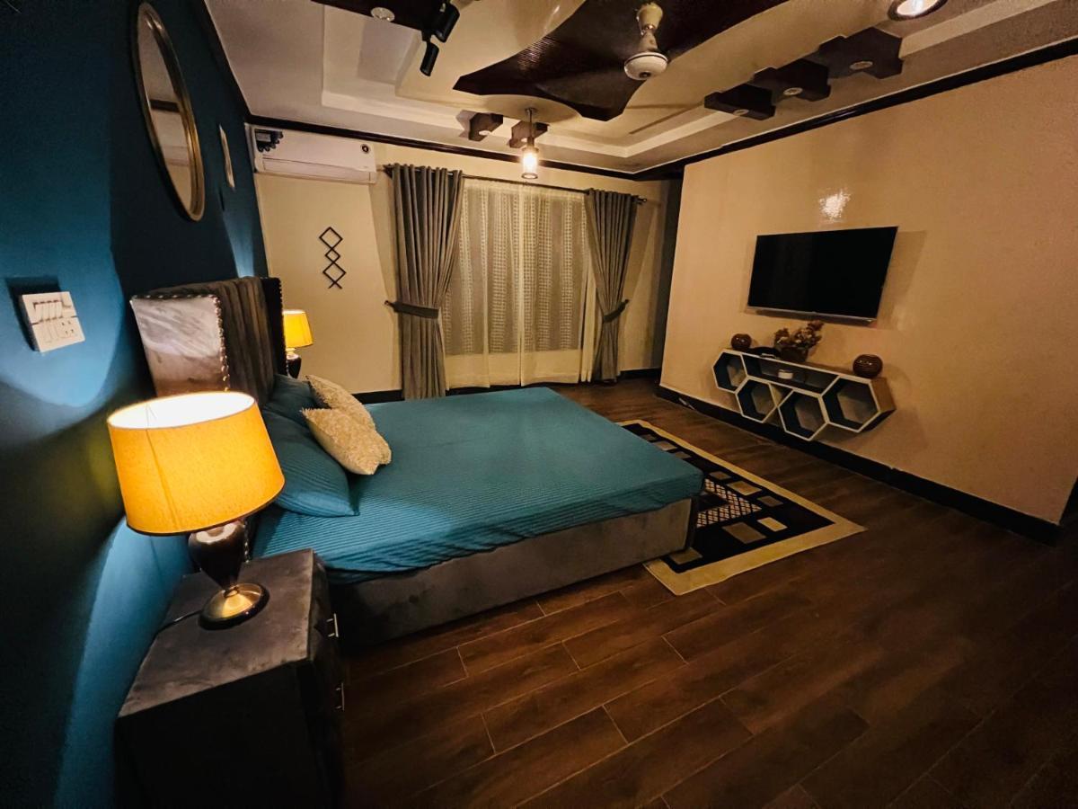 The Comfort Lodge Islamabad Extérieur photo